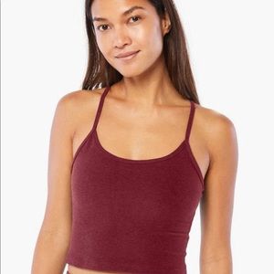 Beyond Yoga Spacedye Slim Racerback Cropped Tank in A maroon red. Size L